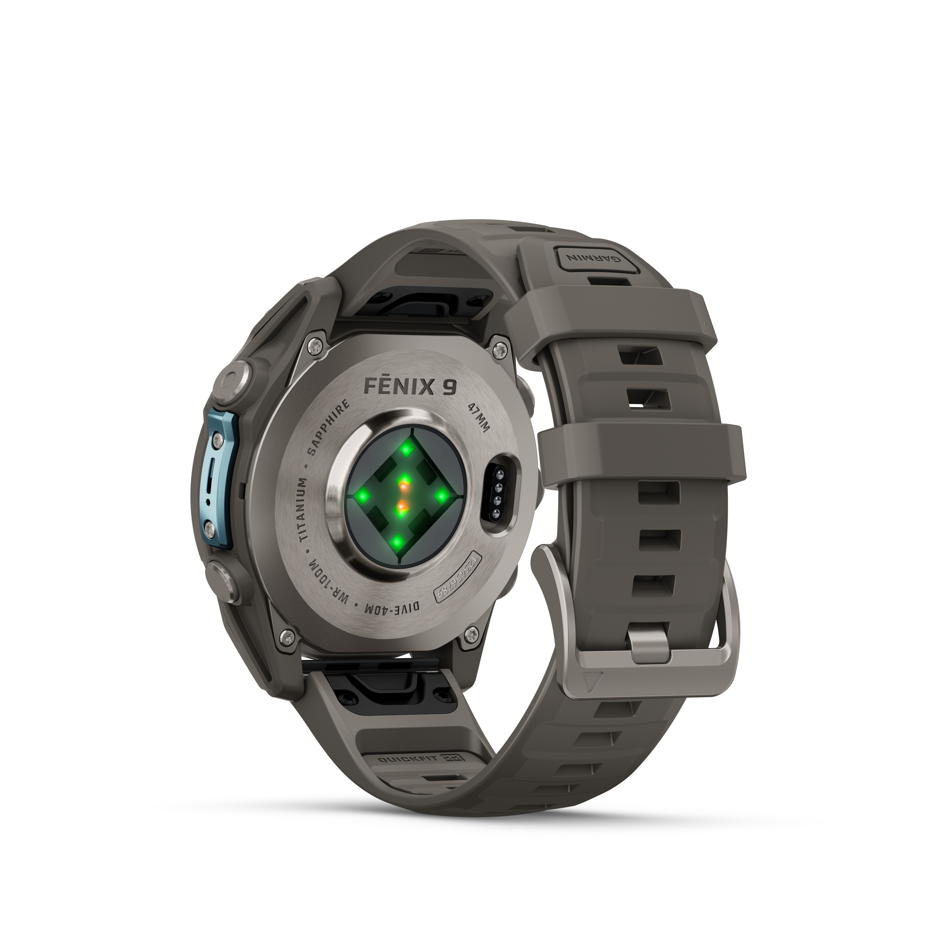 Rückseite einer grauen Garmin Fénix 9 Uhr mit Sensoren und Kautschukarmband auf weißem Hintergrund.