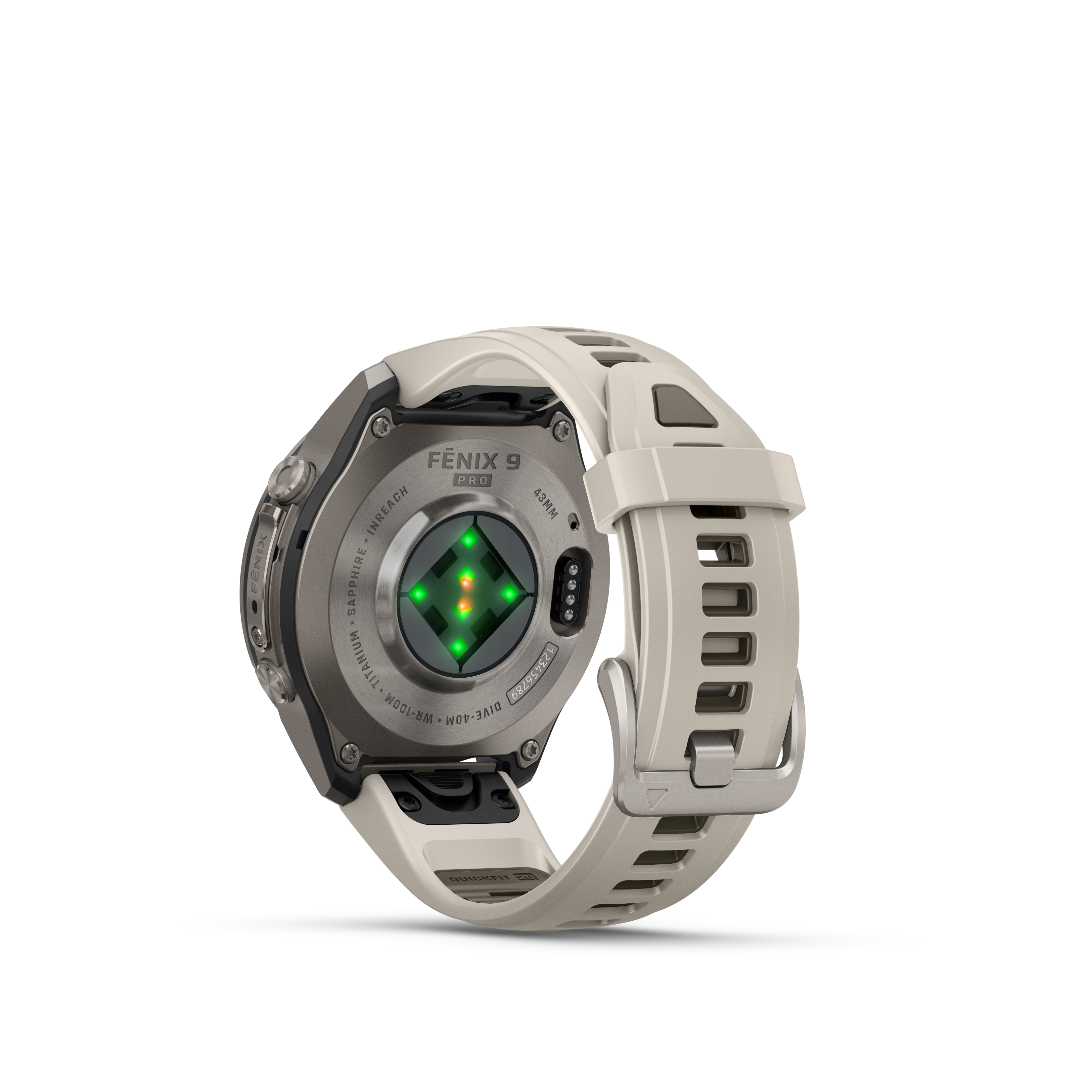 Rückseite einer Garmin Fenix 9 Pro Smartwatch mit Titangehäuse, Sensoren mit grünem Licht und beigem Silikonarmband.