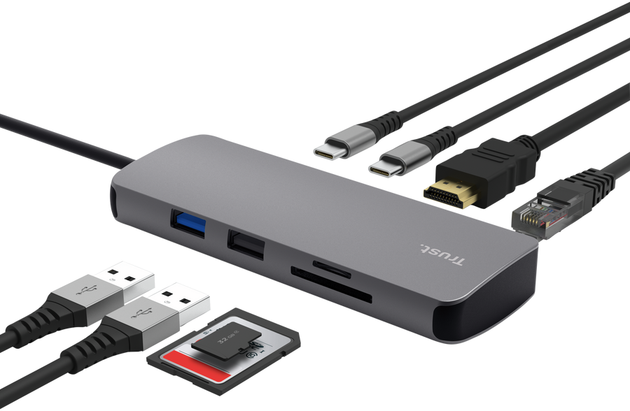 Ein grauer USB-C-Multiport-Hub mit verschiedenen angeschlossenen Kabeln und SD-Karten auf schwarzem Hintergrund.