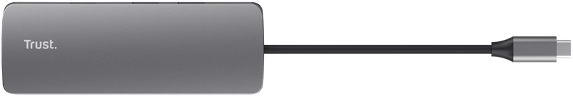 Ein grauer Trust USB-C Hub mit einem kurzen Kabel und Stecker auf schwarzem Hintergrund.