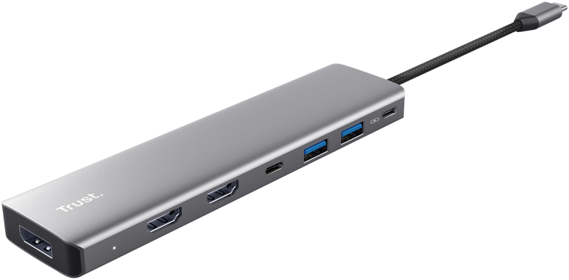 Ein grauer USB-C-Hub mit mehreren Anschlüssen und angeschlossenem Kabel auf schwarzem Hintergrund.