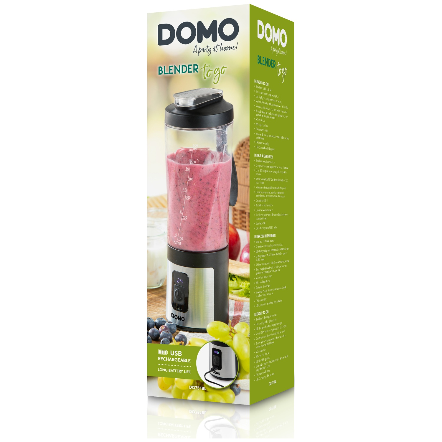 Emballage d'un blender portable Domo avec un smoothie rose, des baies et des raisins sur une table en bois.