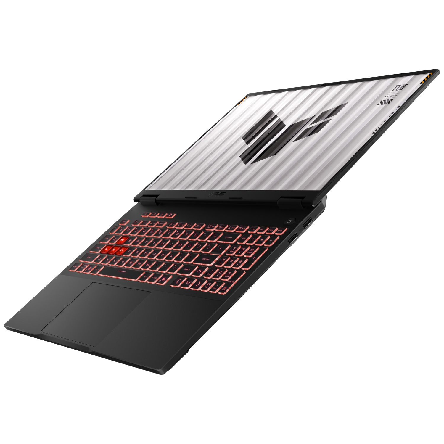 Ordinateur portable de jeu noir avec clavier rétroéclairé rouge et écran rayé sur fond blanc.