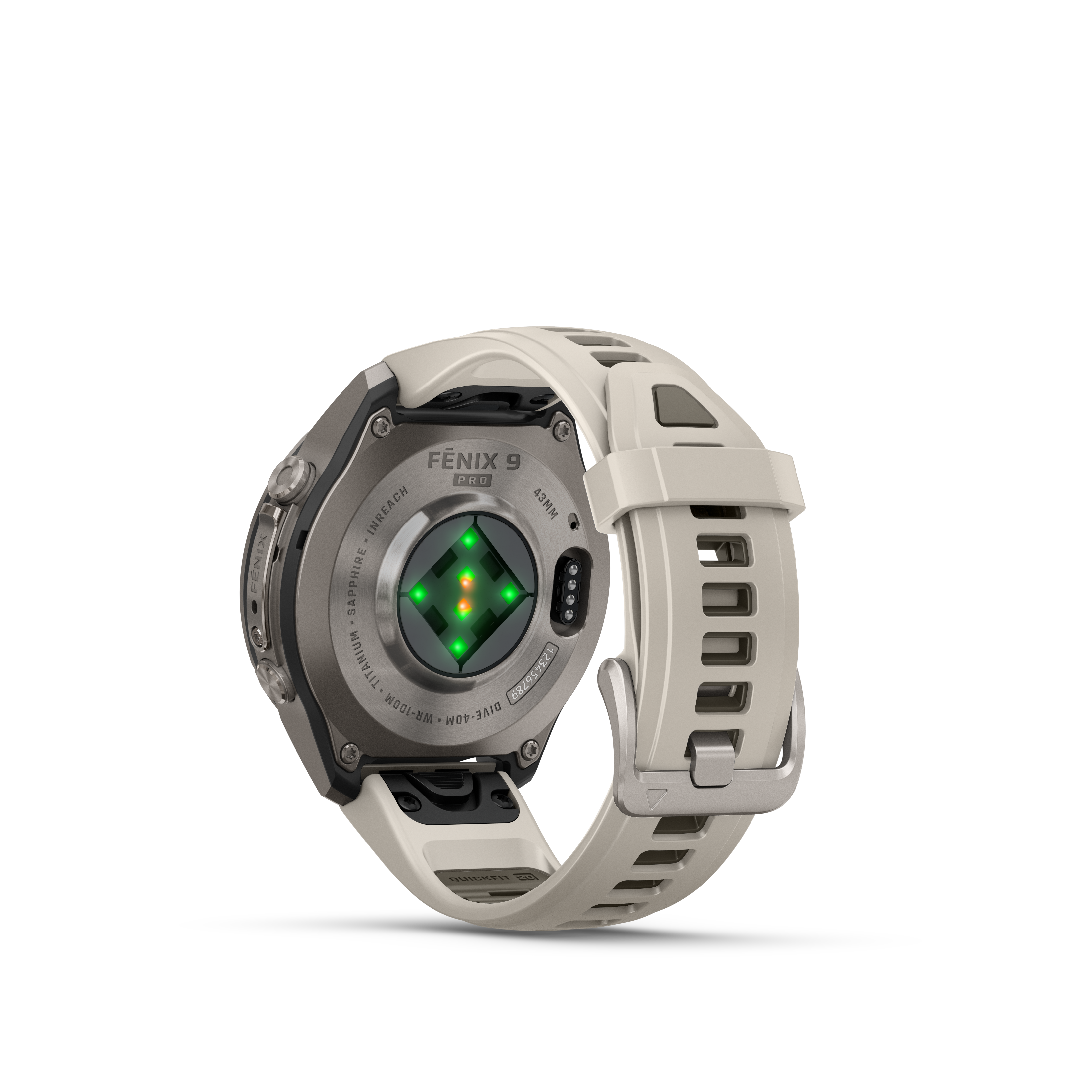 Rückseite einer grauen Garmin Fenix 9 Pro Uhr mit grün leuchtenden Sensoren und einem hellen Silikonarmband.