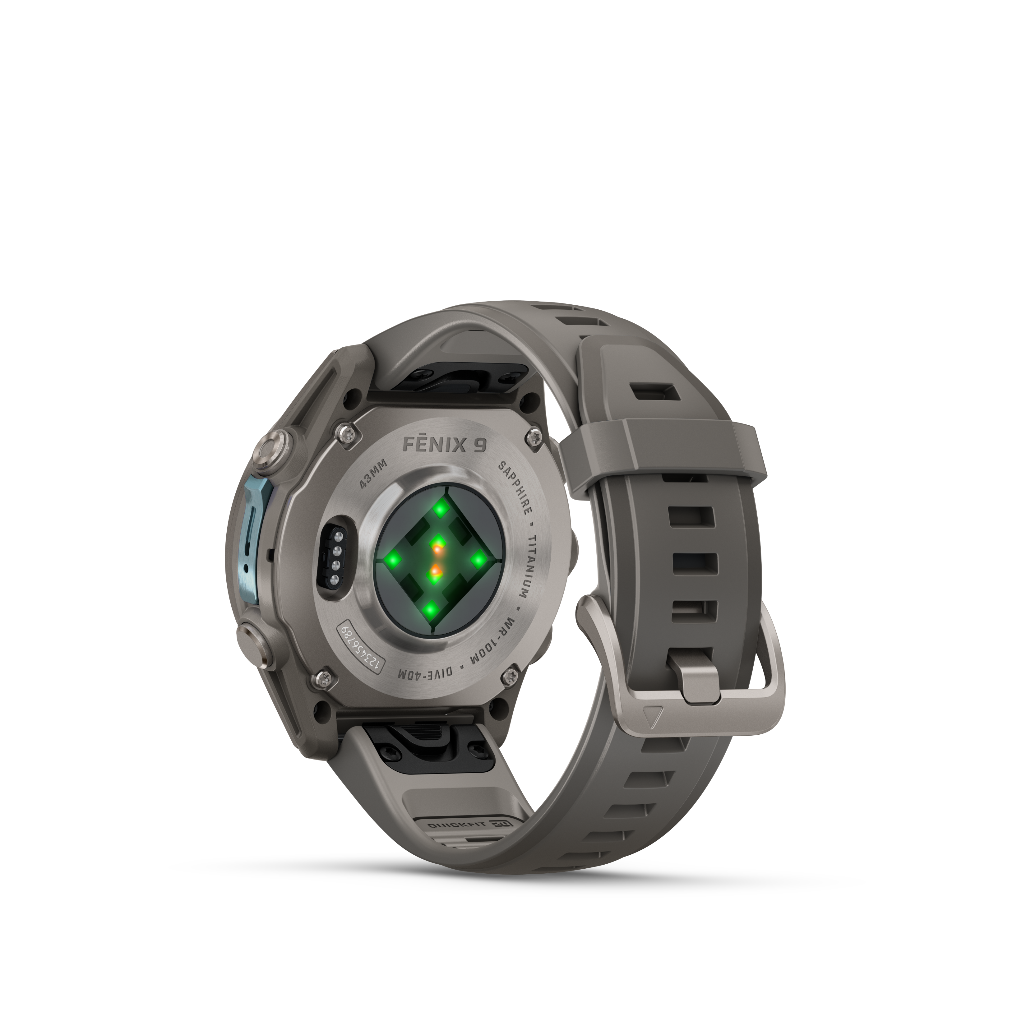 Rückseite einer Fenix 9 Smartwatch mit Titangehäuse und grünem Herzfrequenzsensor auf schwarzem Hintergrund.