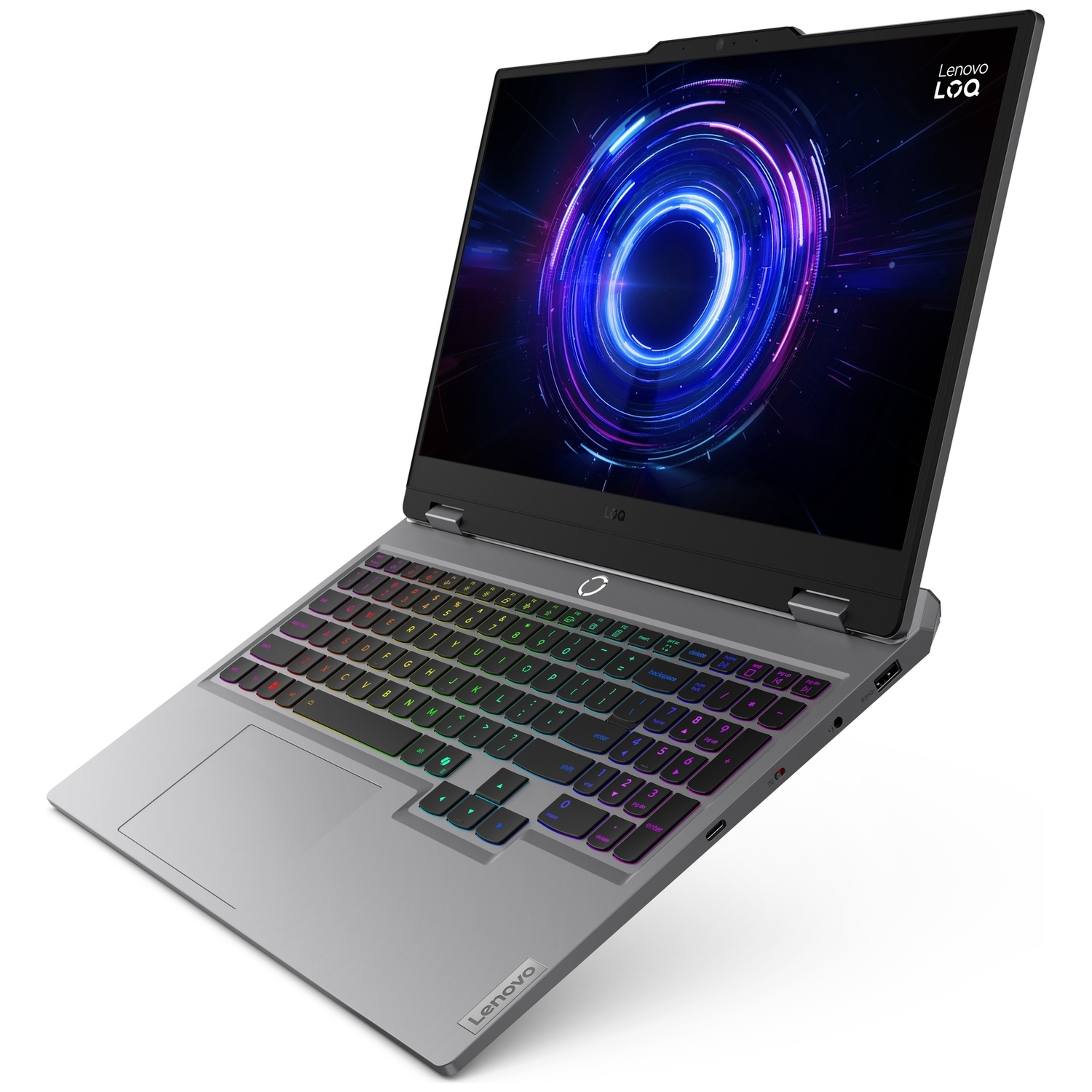 Un ordinateur portable Lenovo LOQ argenté avec un clavier rétroéclairé et un fond d'écran abstrait.