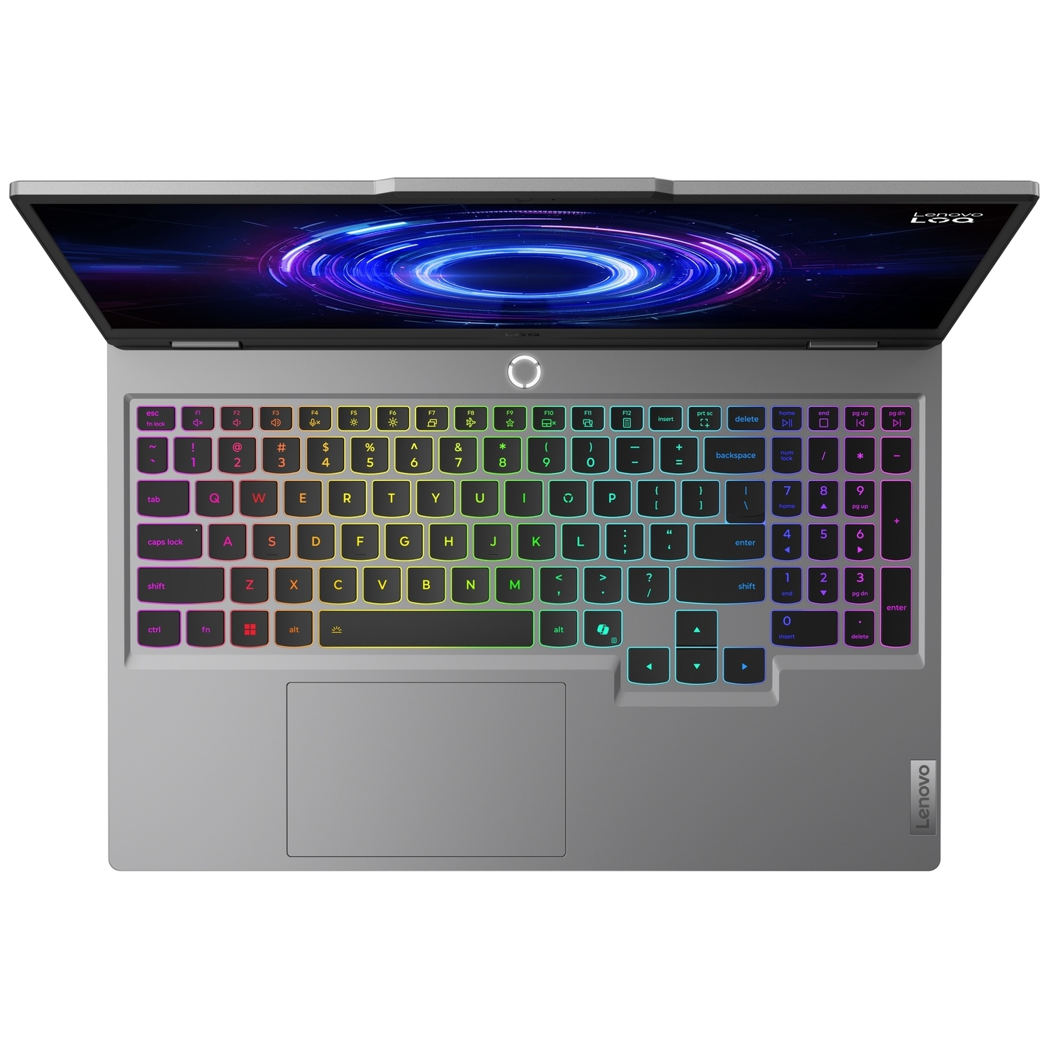 Ordinateur portable Lenovo gris vu du dessus avec clavier rétroéclairé RGB et fond d'écran vortex bleu.