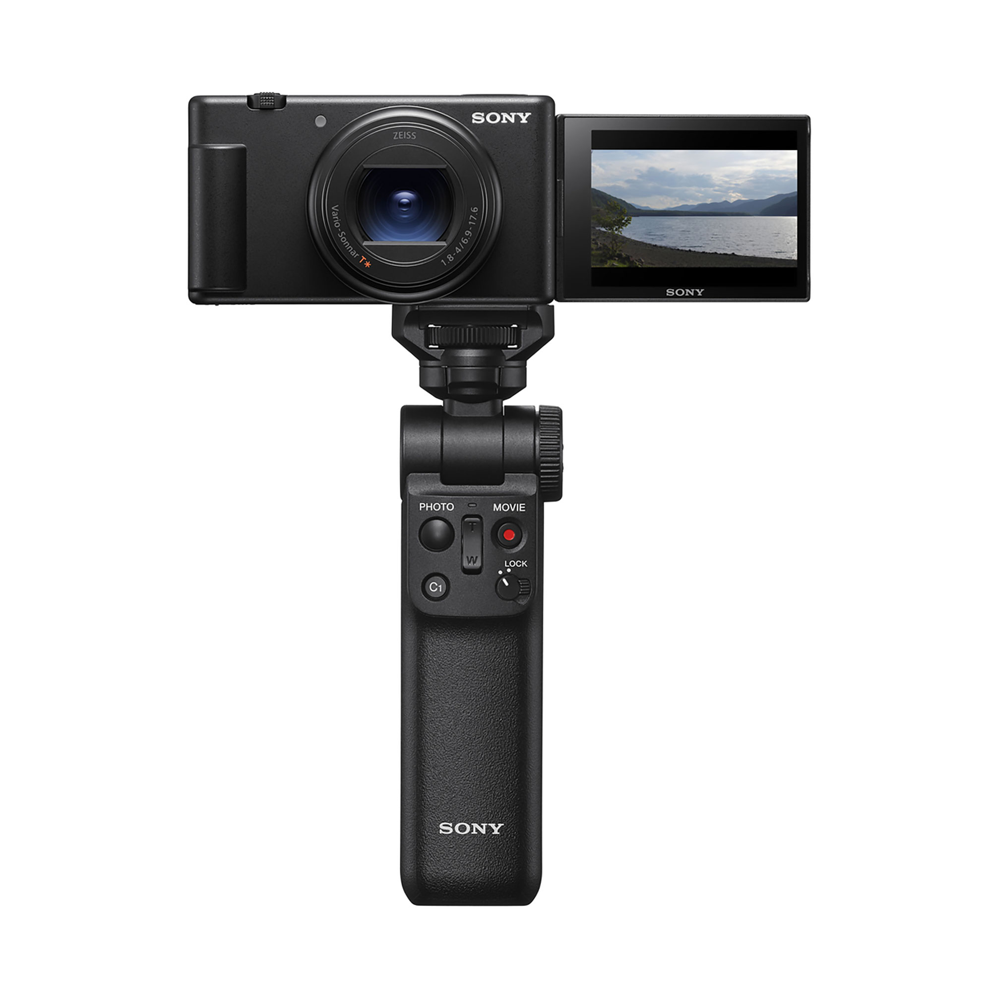 Eine schwarze Sony-Kompaktkamera mit Klappdisplay montiert auf einem Griff mit Bedienelementen.