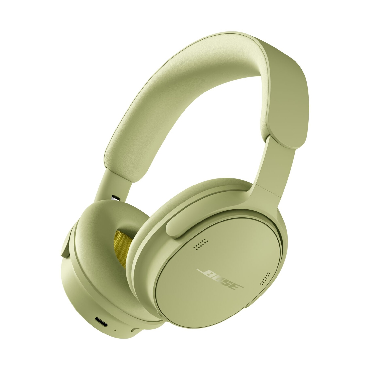 Cuffie over-ear Bose verde chiaro con archetto morbido su sfondo bianco.