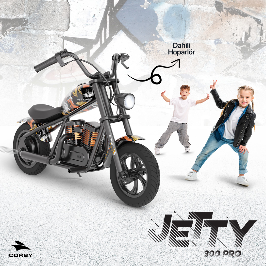 Grafiti duvarının önünde iki dans eden çocukla birlikte çocuk oyuncak chopper motosiklet.