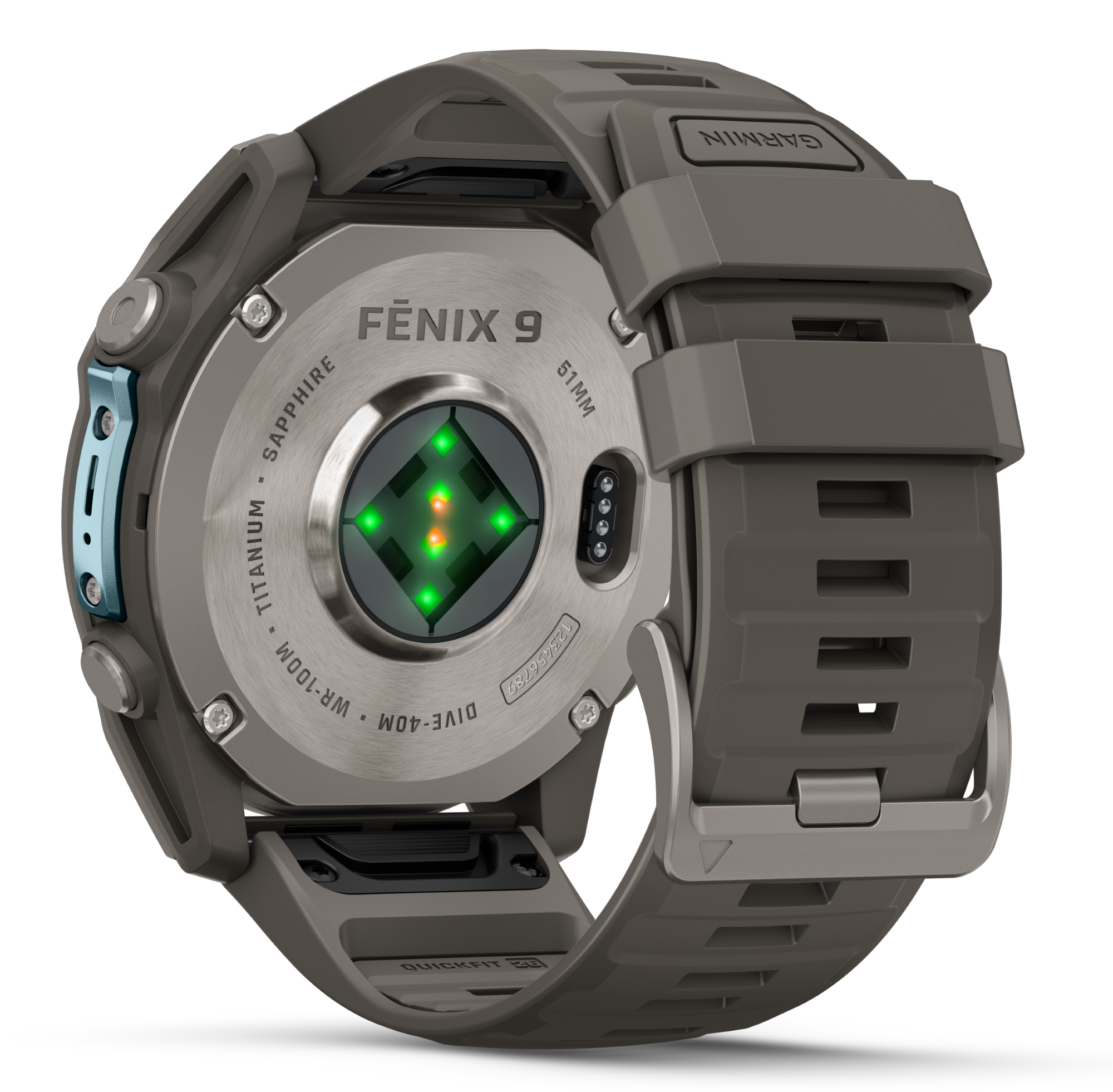 Tył szarego smartwatcha Garmin Fenix 9 z czujnikami i gumowym paskiem na czarnym tle.