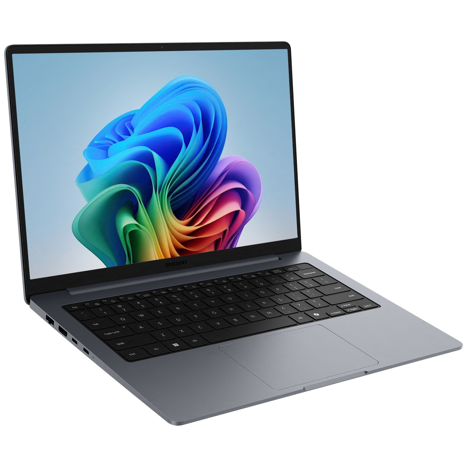 Un ordinateur portable gris avec un clavier noir et un fond d'écran abstrait coloré sur l'écran.