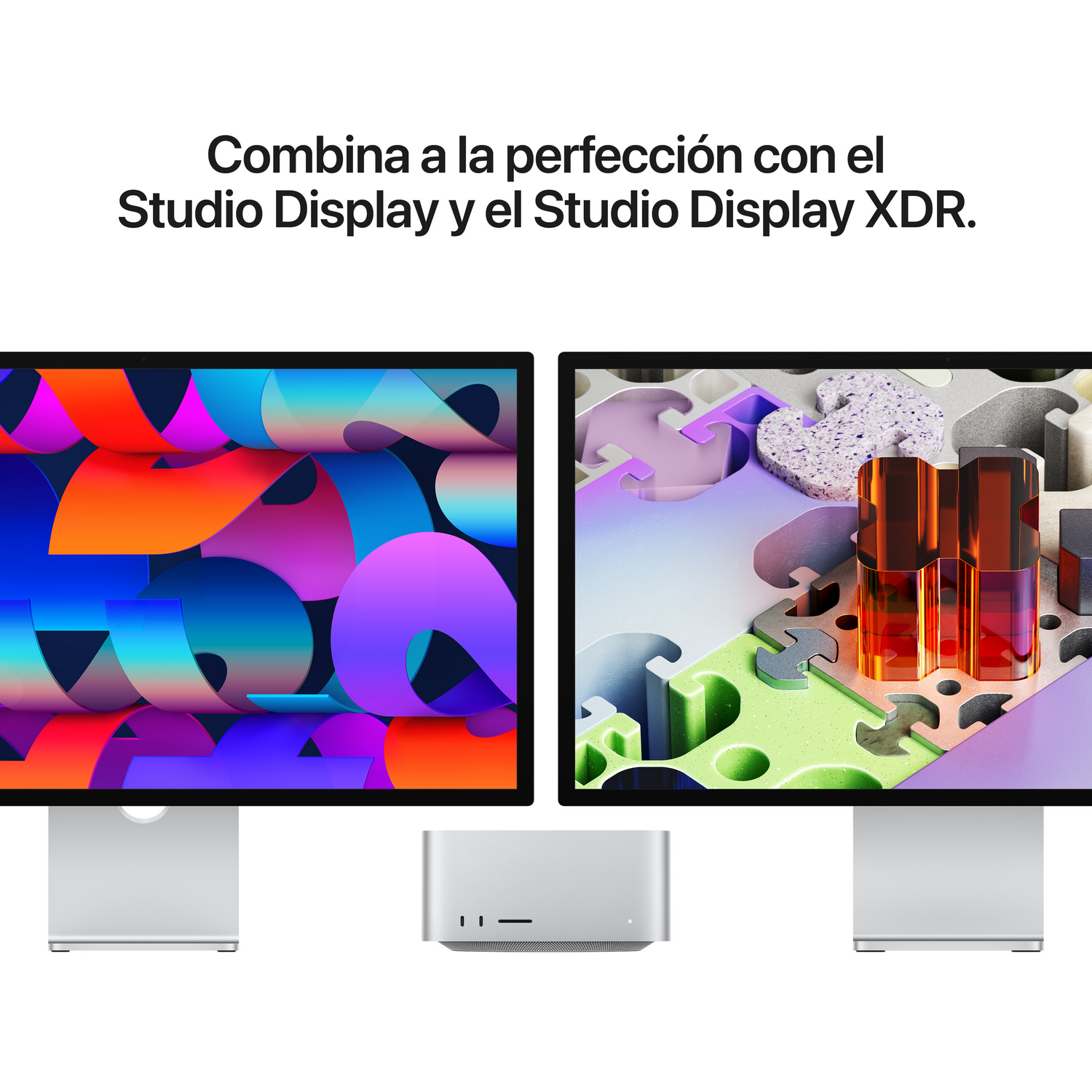 Dos monitores con pantallas coloridas flanquean una computadora plateada.