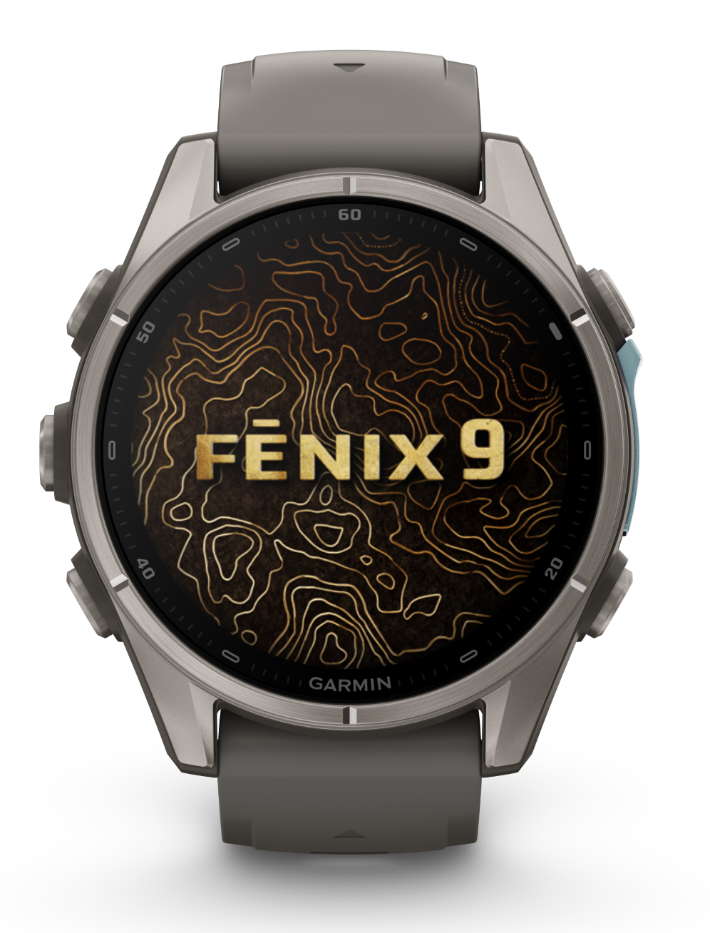 Szary smartwatch Garmin Fenix 9 wyświetla złoty wzór mapy topograficznej na tarczy.