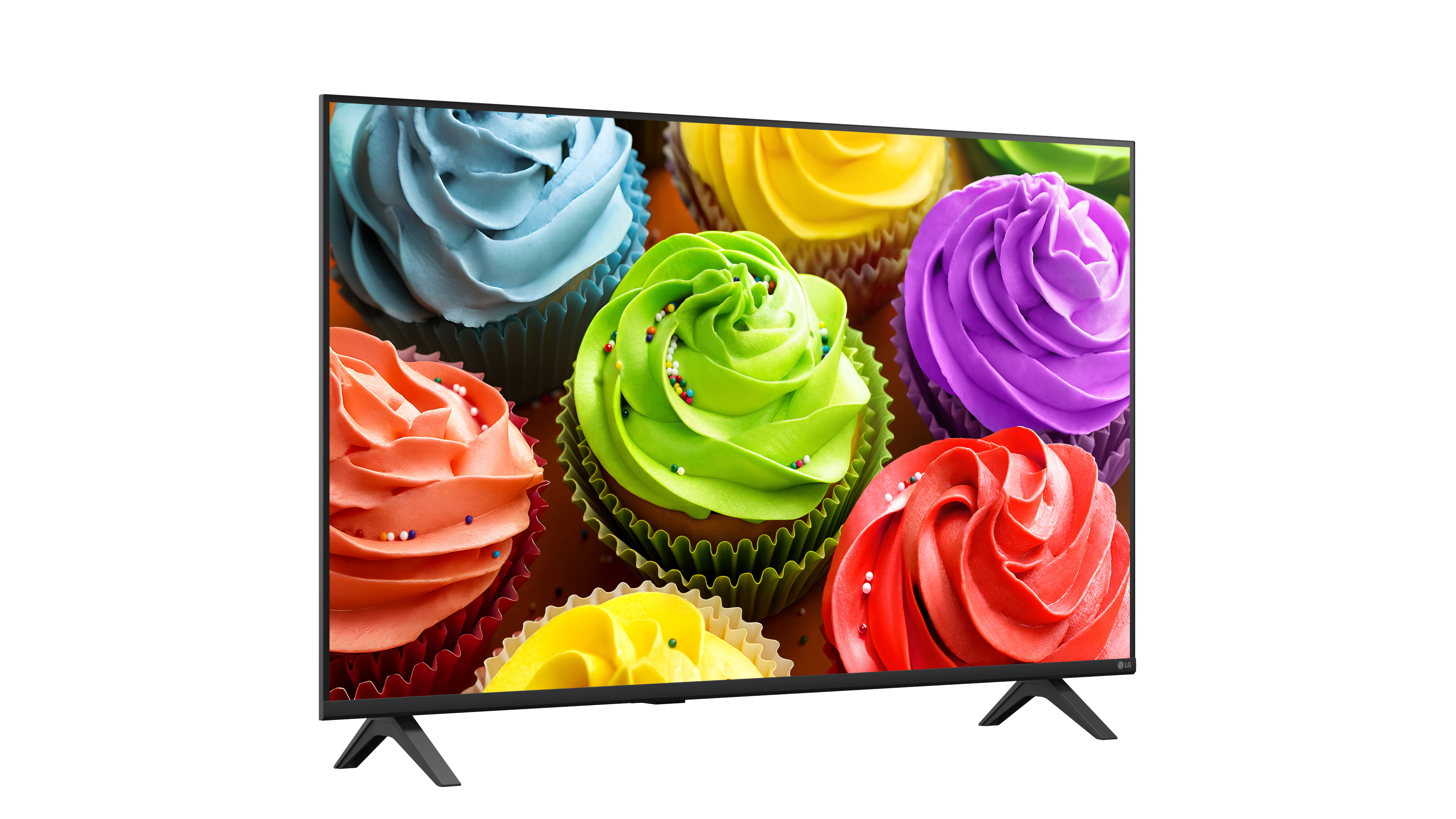 Egy modern televízió fehér háttérrel színes muffinokat mutat különböző színű krémmel.