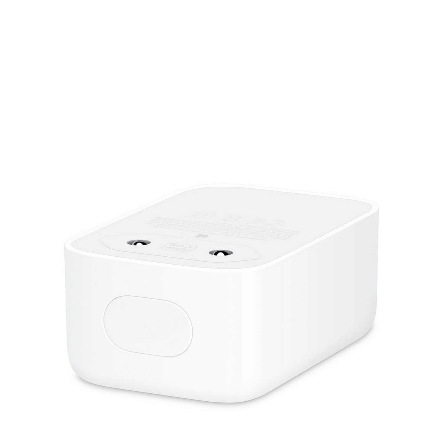 Un adaptador de corriente USB-C de Apple blanco sobre fondo blanco.