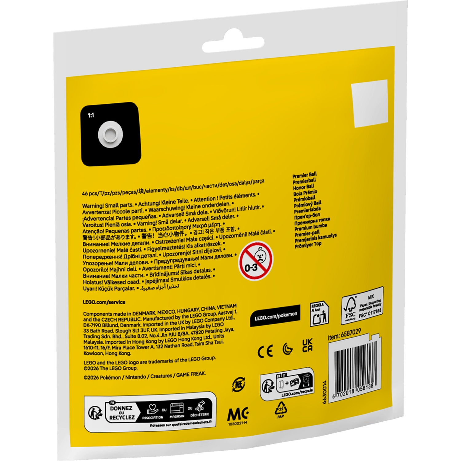 Back of a yellow Lego package with safety warnings, product info, and logos on a white background.