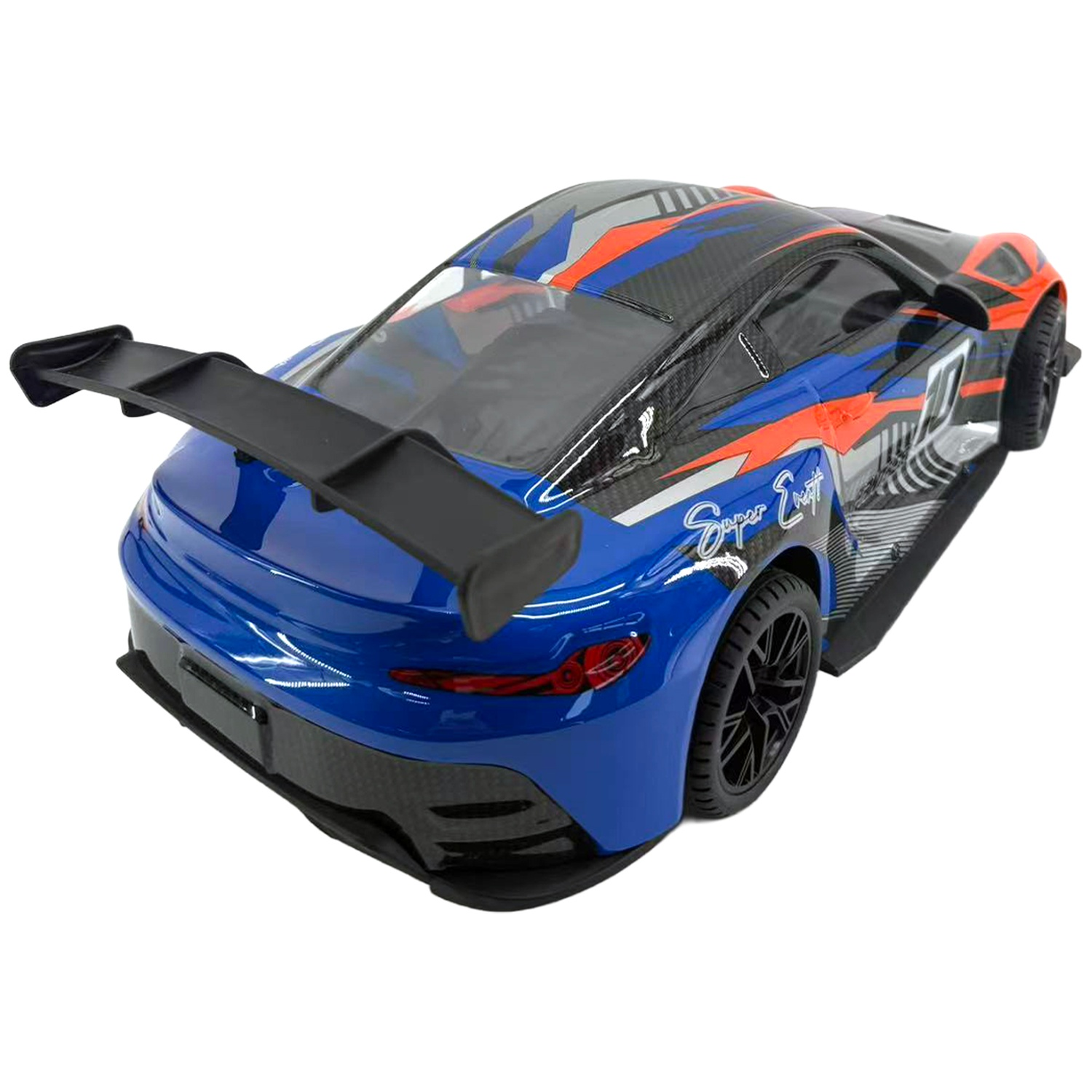 A blue, red, and black remote control racing car with a large rear spoiler on a white background.