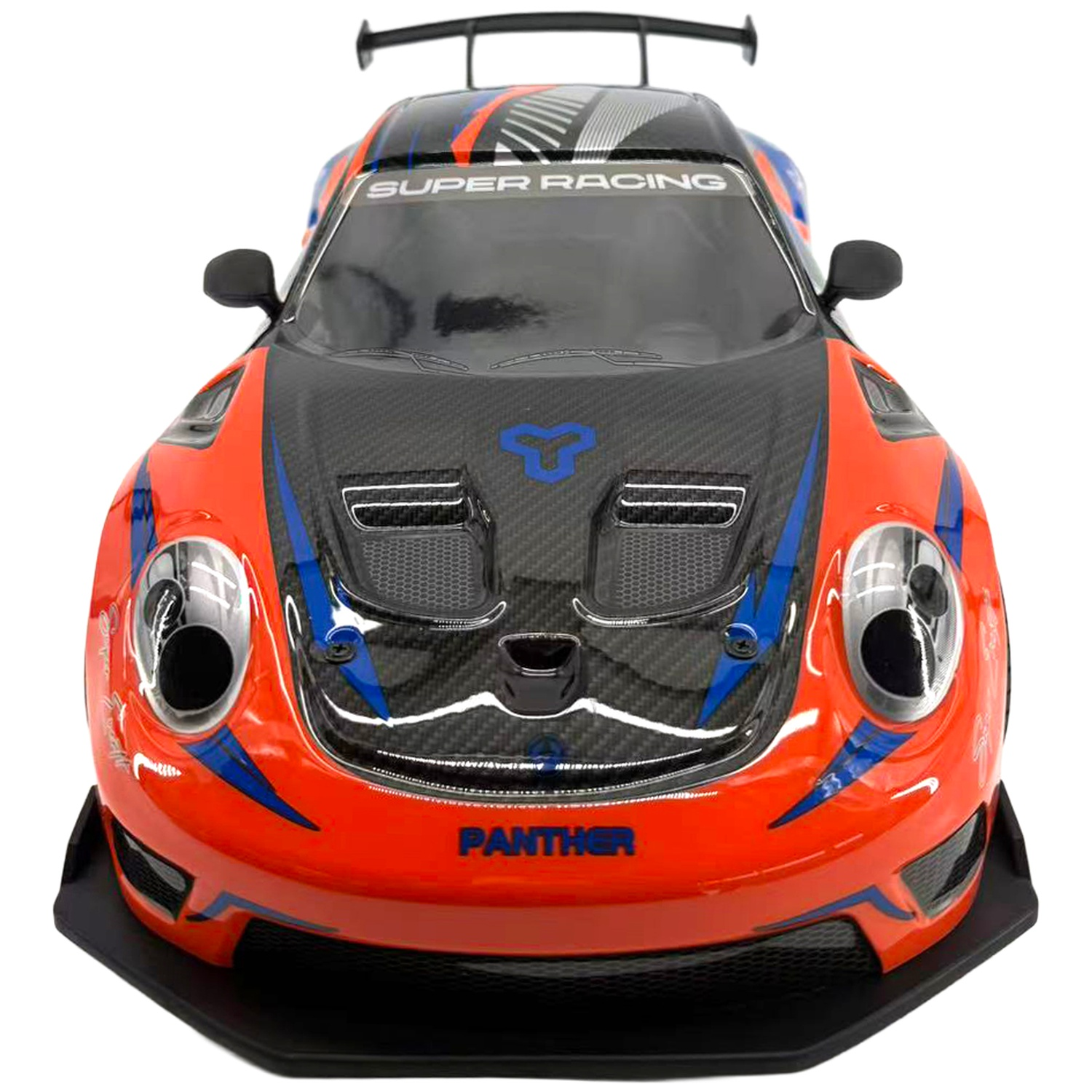 A red and blue remote control race car with a carbon fiber hood, large headlights, and a black rear spoiler.