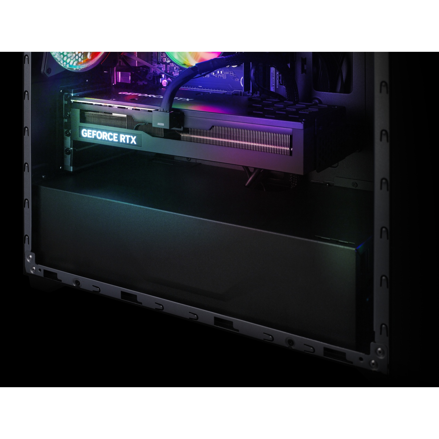A PC case interior shows an illuminated GeForce RTX graphics card and colorful fans in the background.