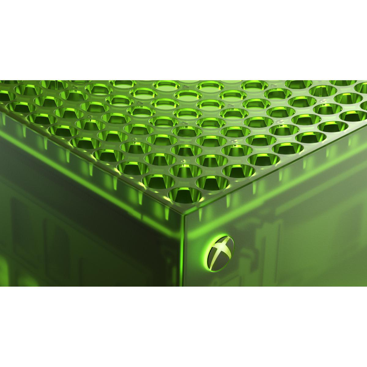 Glänzende grüne Oberfläche einer Konsole mit runden Öffnungen und leuchtendem Xbox-Logo.