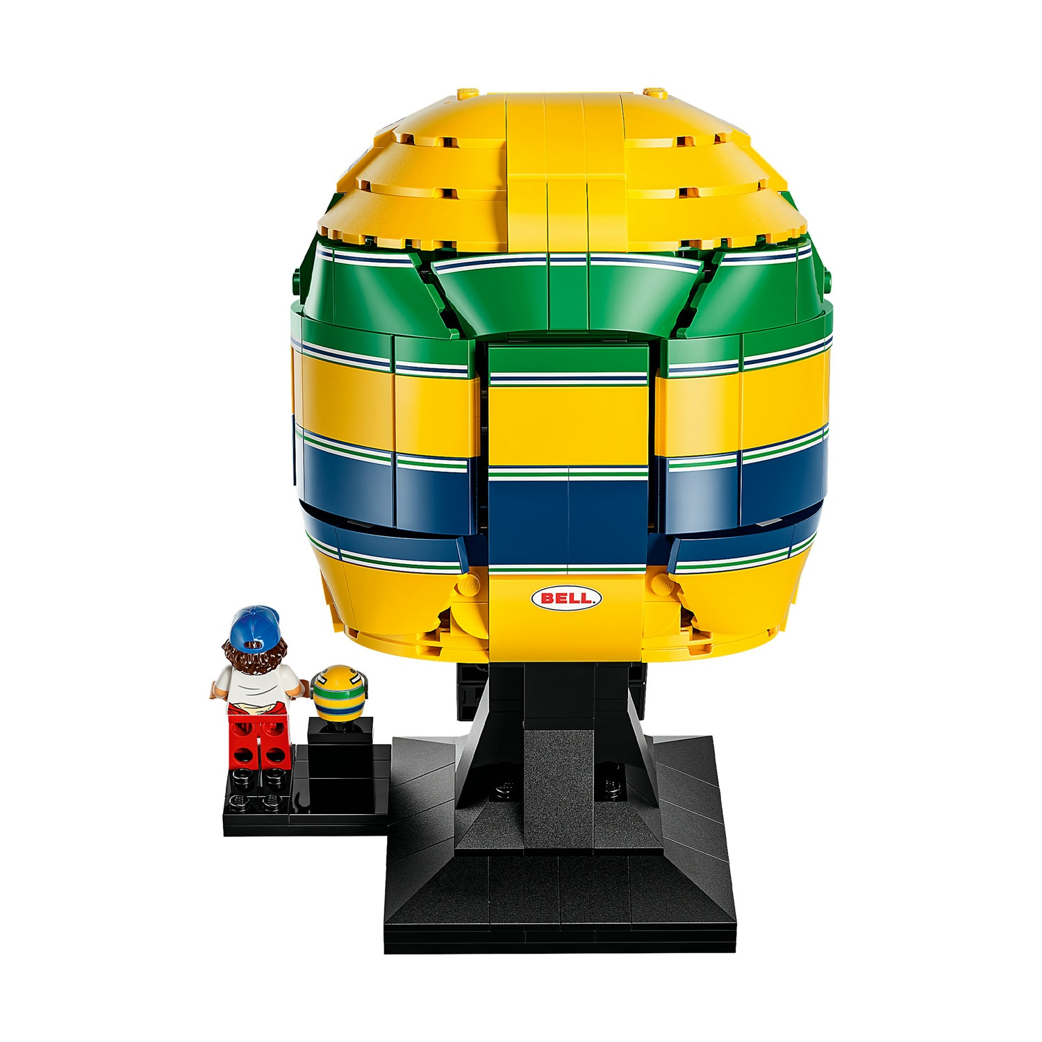 Vista posteriore di un casco da corsa Lego giallo, verde e blu su supporto nero.