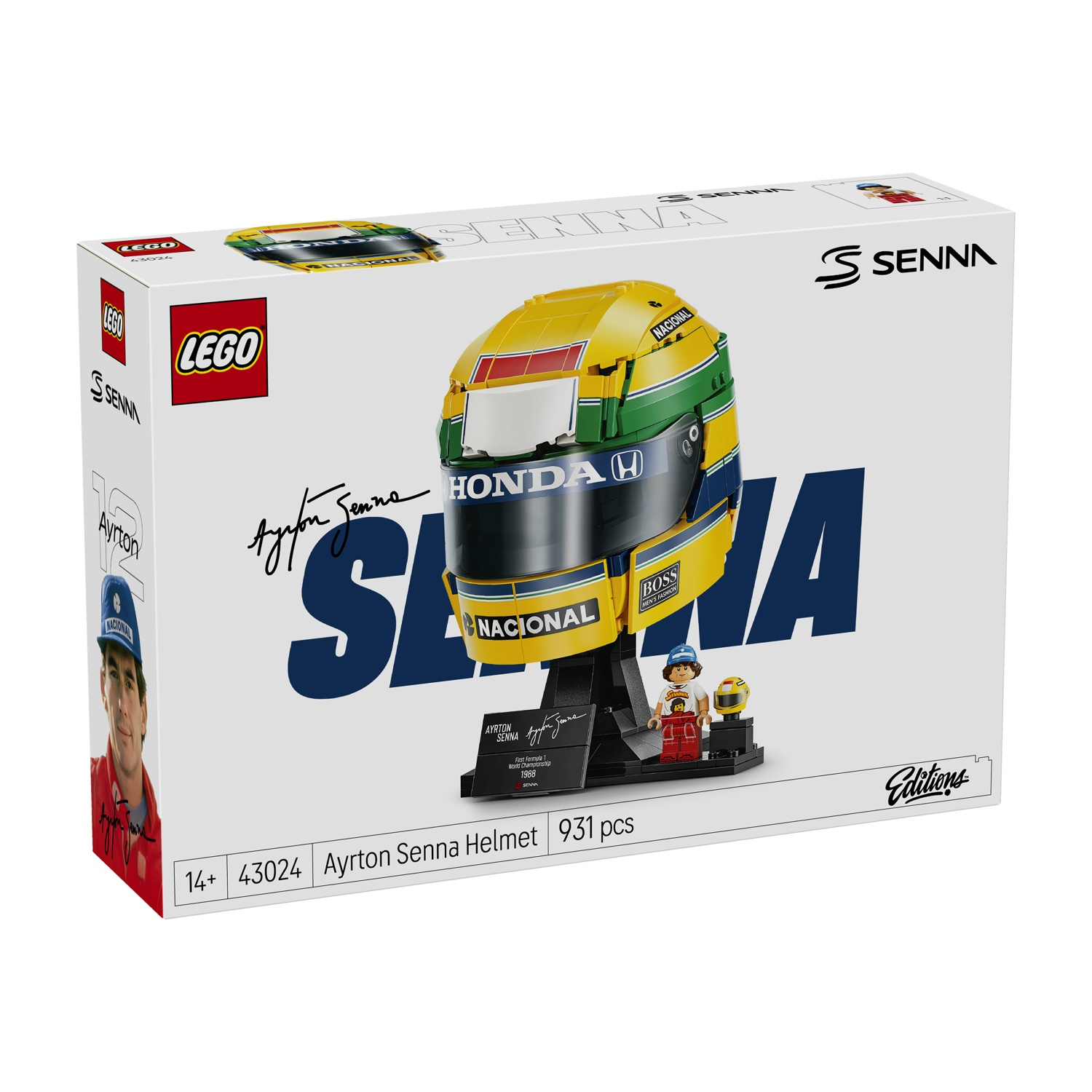 Scatola del casco LEGO Ayrton Senna che mostra il casco da corsa giallo, verde e blu assemblato su un supporto con minifigure.