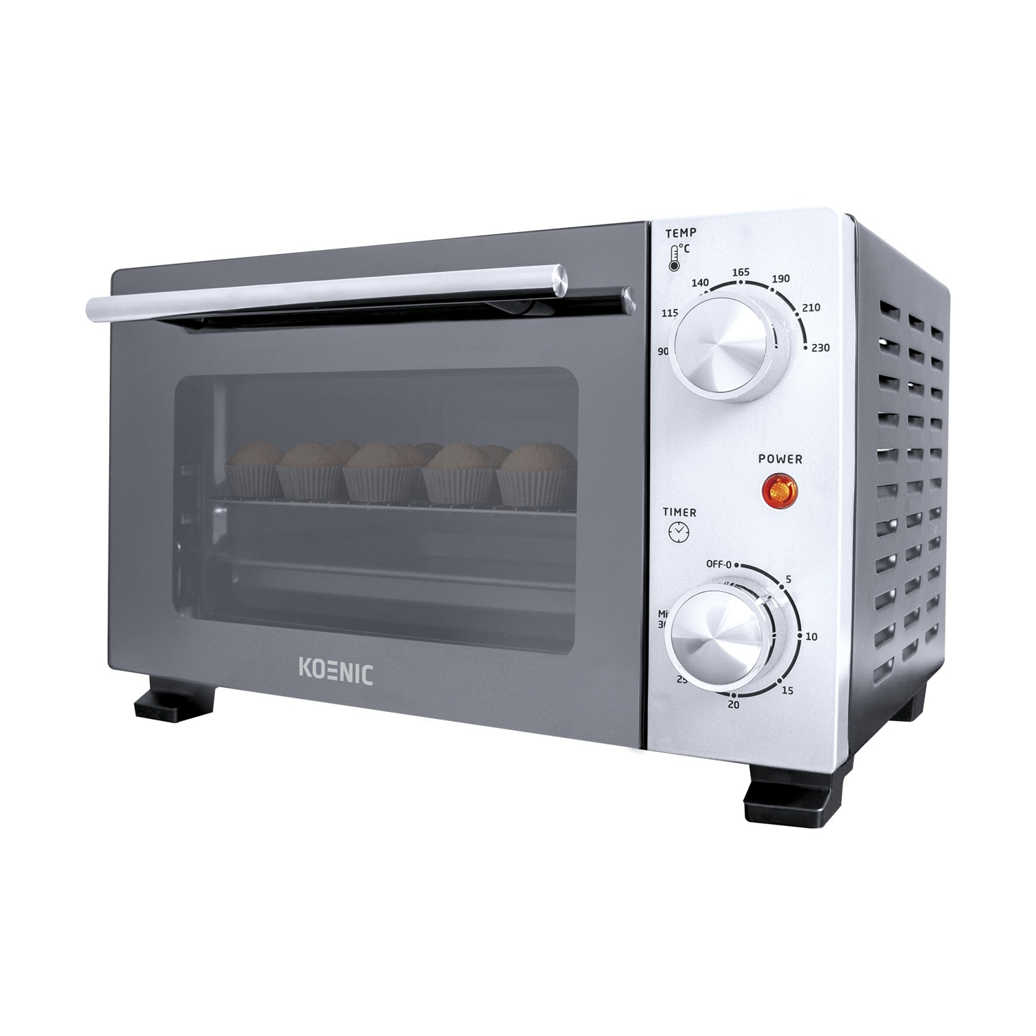 Un mini forno Koenic argentato con manopole per temperatura e timer, contenente muffin all'interno.