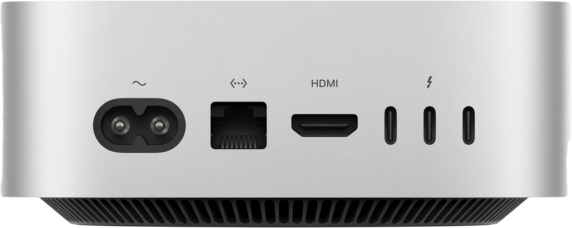 Egy ezüstszínű eszköz hátlapi csatlakozói: tápcsatlakozó, ethernet, HDMI és három USB-C port.