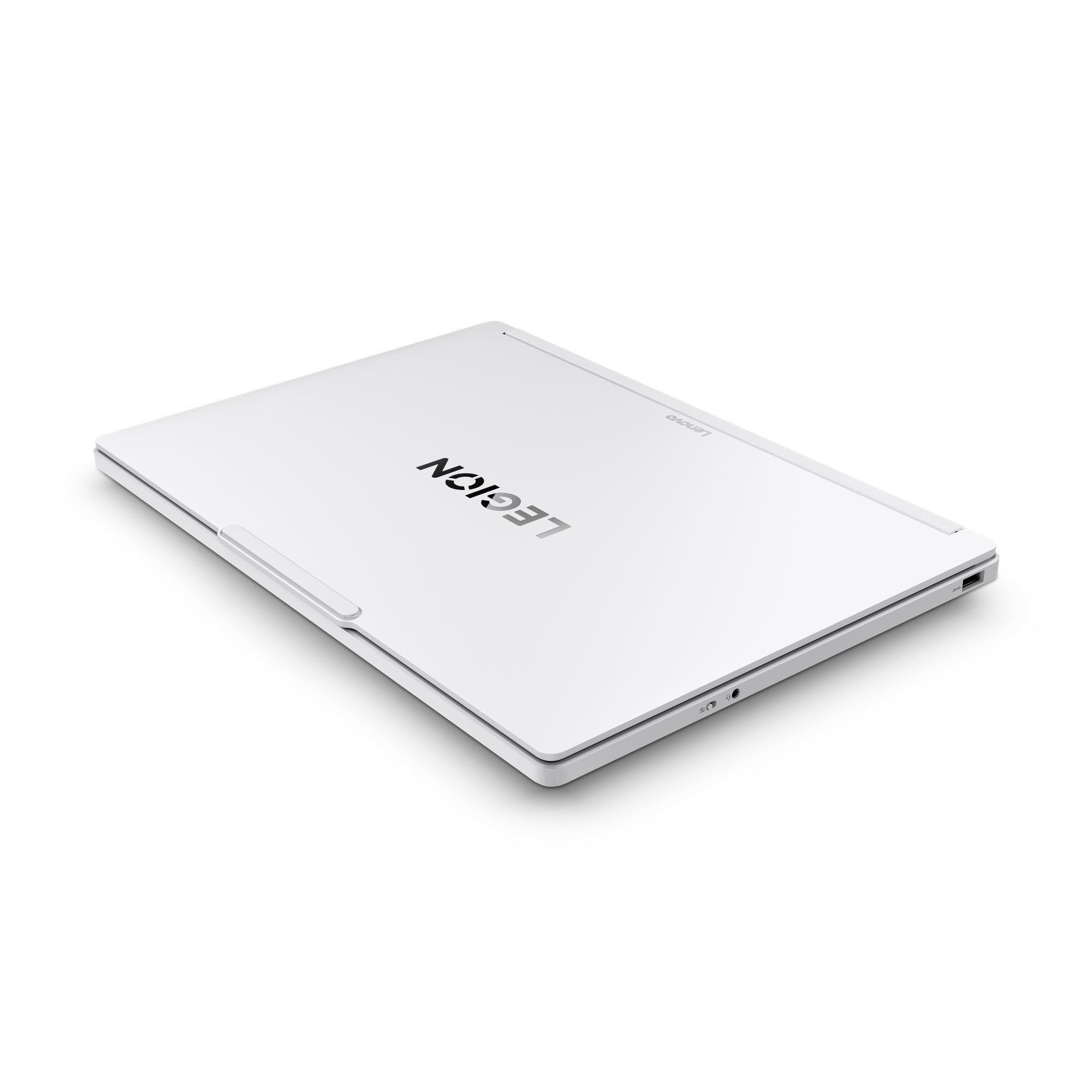 Ein geschlossener weißer Lenovo Legion Laptop liegt auf schwarzem Hintergrund.