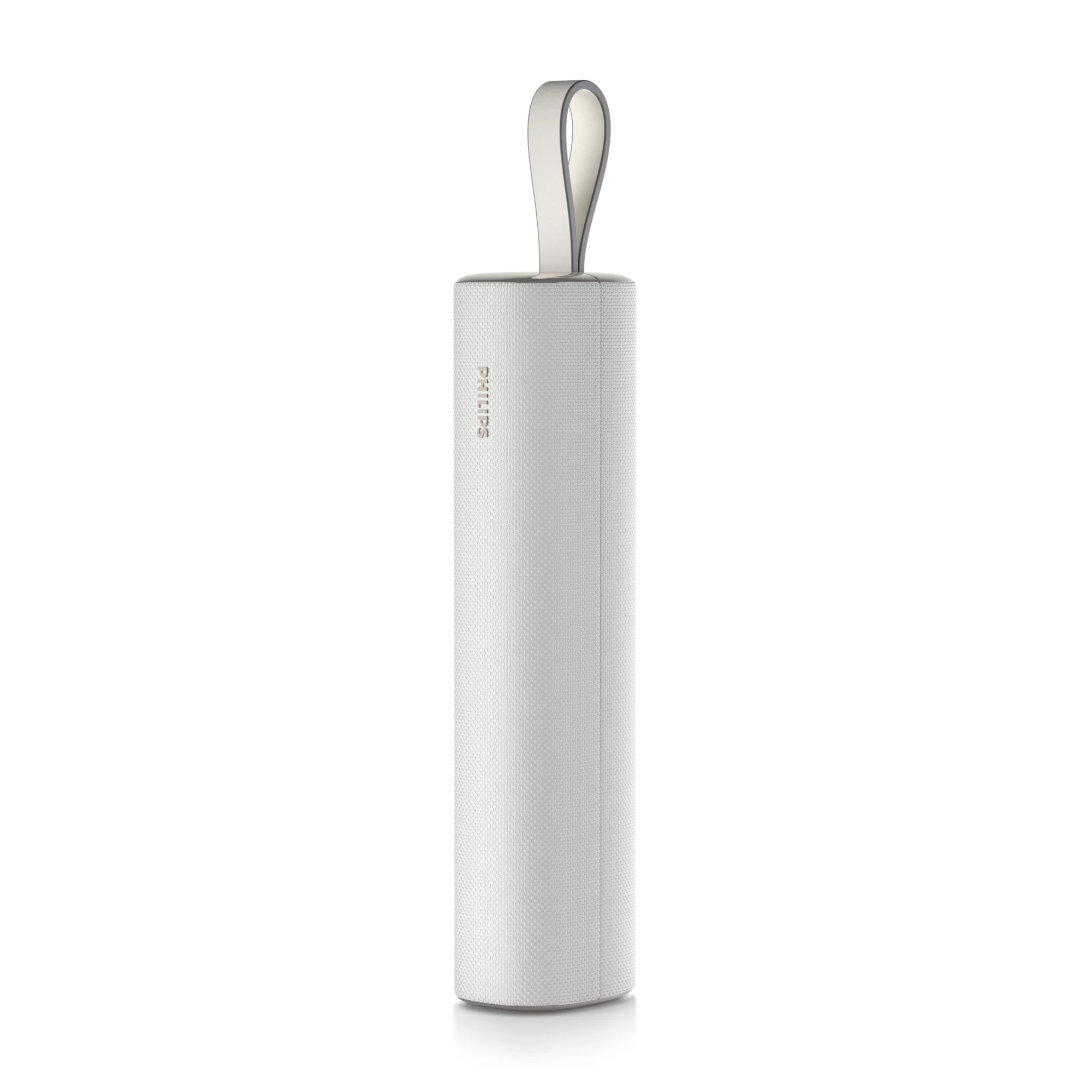 Cylindryczny, biały głośnik Bluetooth Philips z wygodnym szarym paskiem do przenoszenia na białym tle.