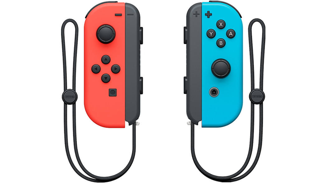 Deux manettes Joy-Con pour Nintendo Switch en rouge et bleu néon avec dragonnes noires.