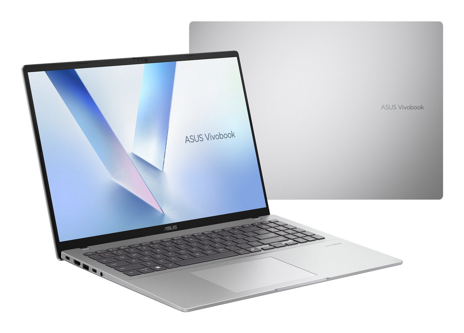 Portátil ASUS Vivobook plateado abierto con pantalla encendida y vista cerrada al fondo sobre fondo blanco.