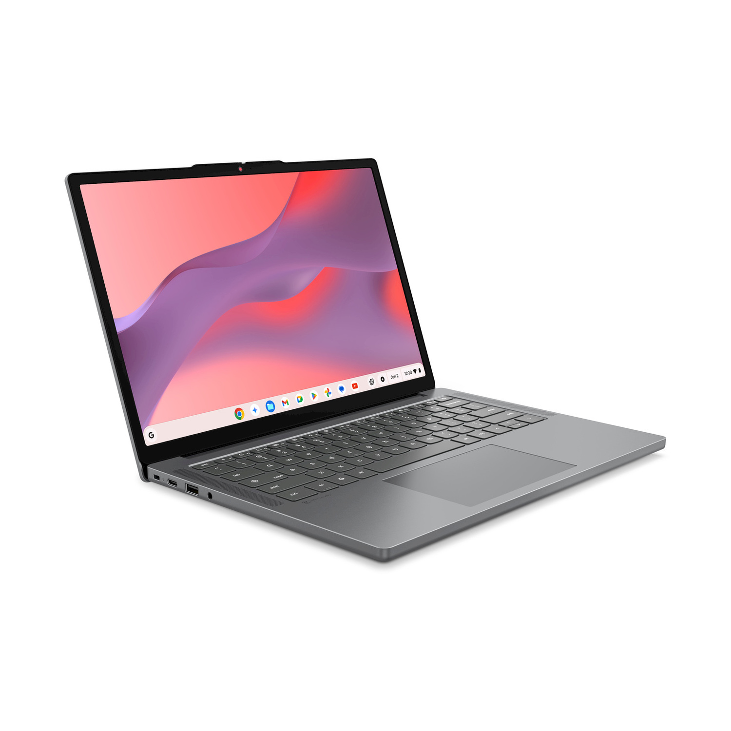 Un laptop grigio è aperto su sfondo bianco, mostrando uno sfondo astratto colorato e una tastiera nera.