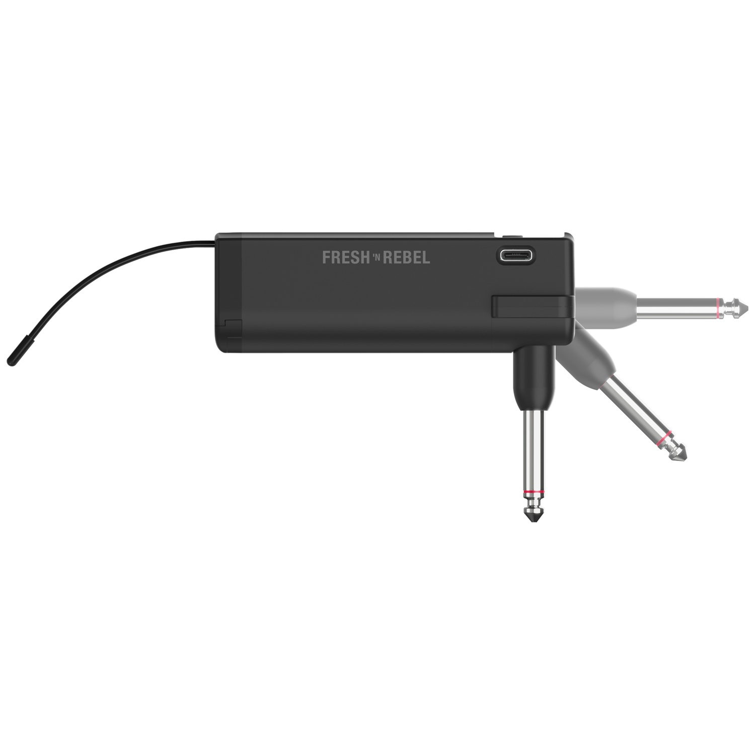 Een zwarte Fresh 'n Rebel audio-adapter met opklapbare jackplug en aangesloten kabel tegen een witte achtergrond.