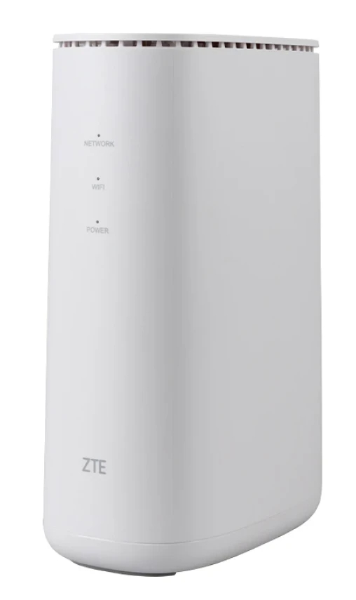 Biały, pionowy router Wi-Fi ZTE z lampkami kontrolnymi z przodu na białym tle.