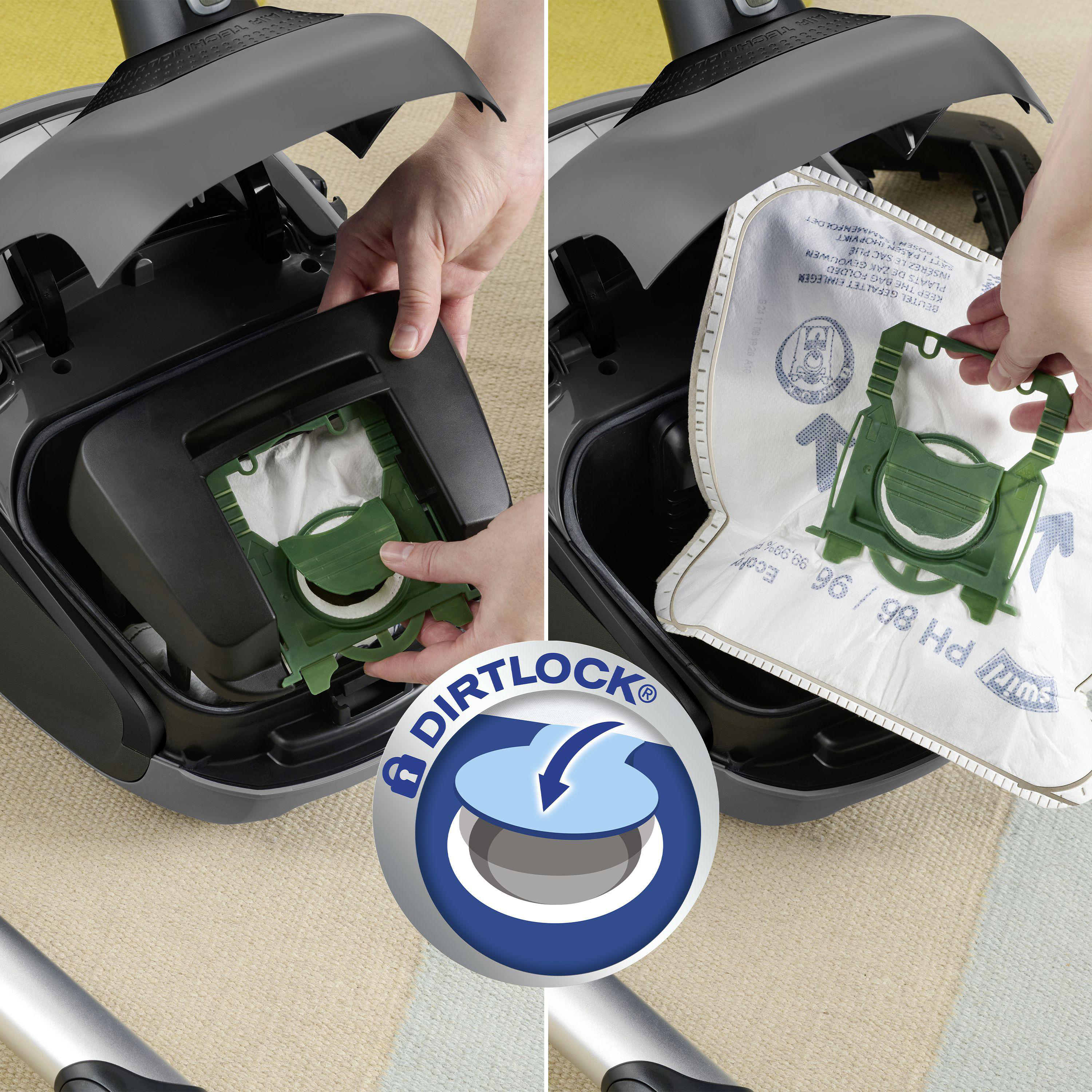 Hände wechseln einen Staubsaugerbeutel in einem grauen Staubsauger, mit einem Dirtlock-Logo.