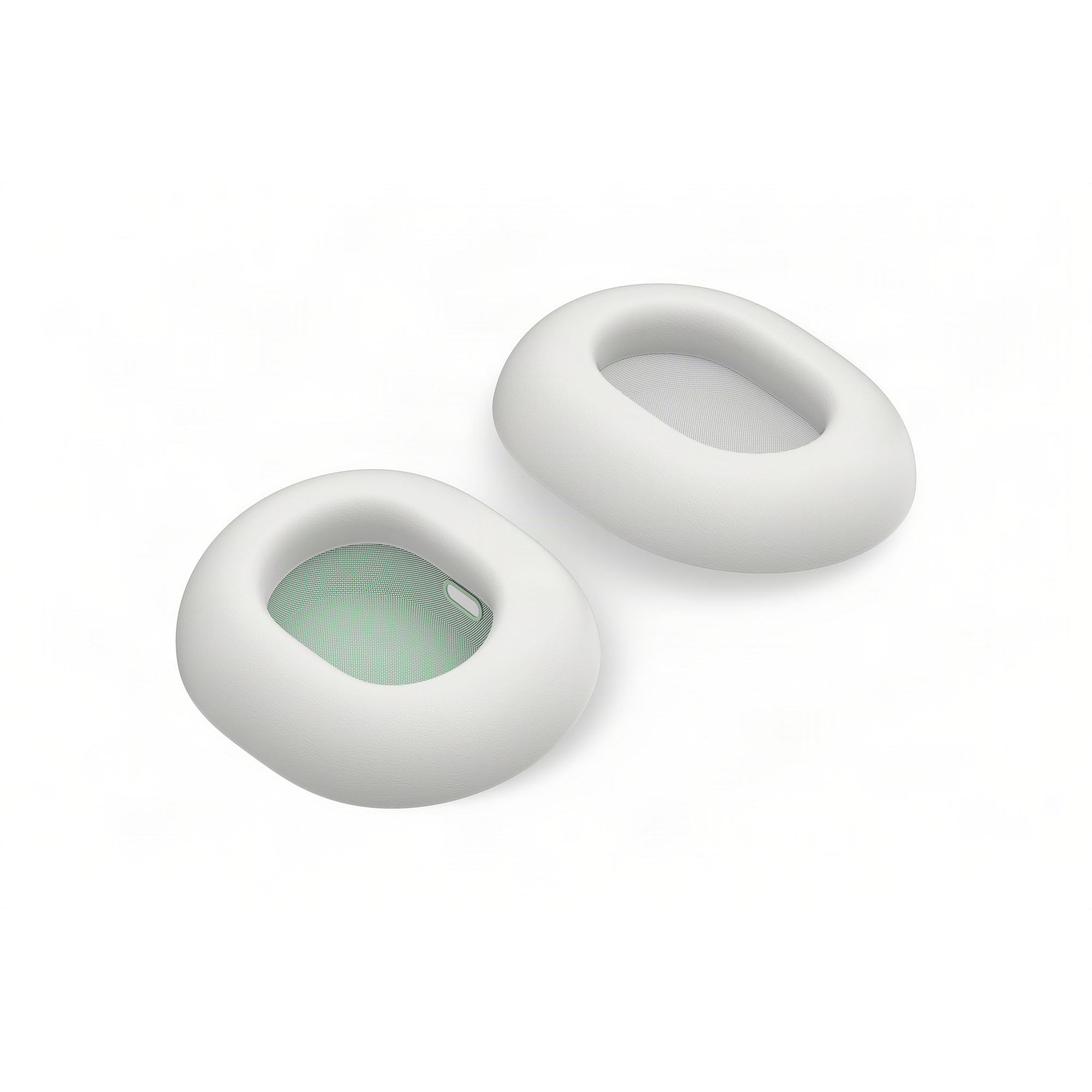 Dos almohadillas blancas para auriculares con malla verde sobre fondo blanco.