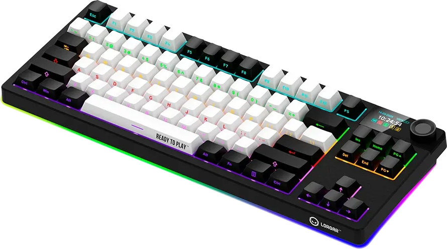 Fekete-fehér gamer billentyűzet RGB háttérvilágítással, kijelzővel és hangerőszabályzóval fekete háttérrel.