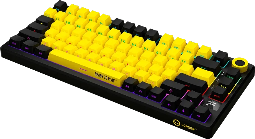 Fekete mechanikus billentyűzet élénksárga gombokkal és RGB háttérvilágítással.