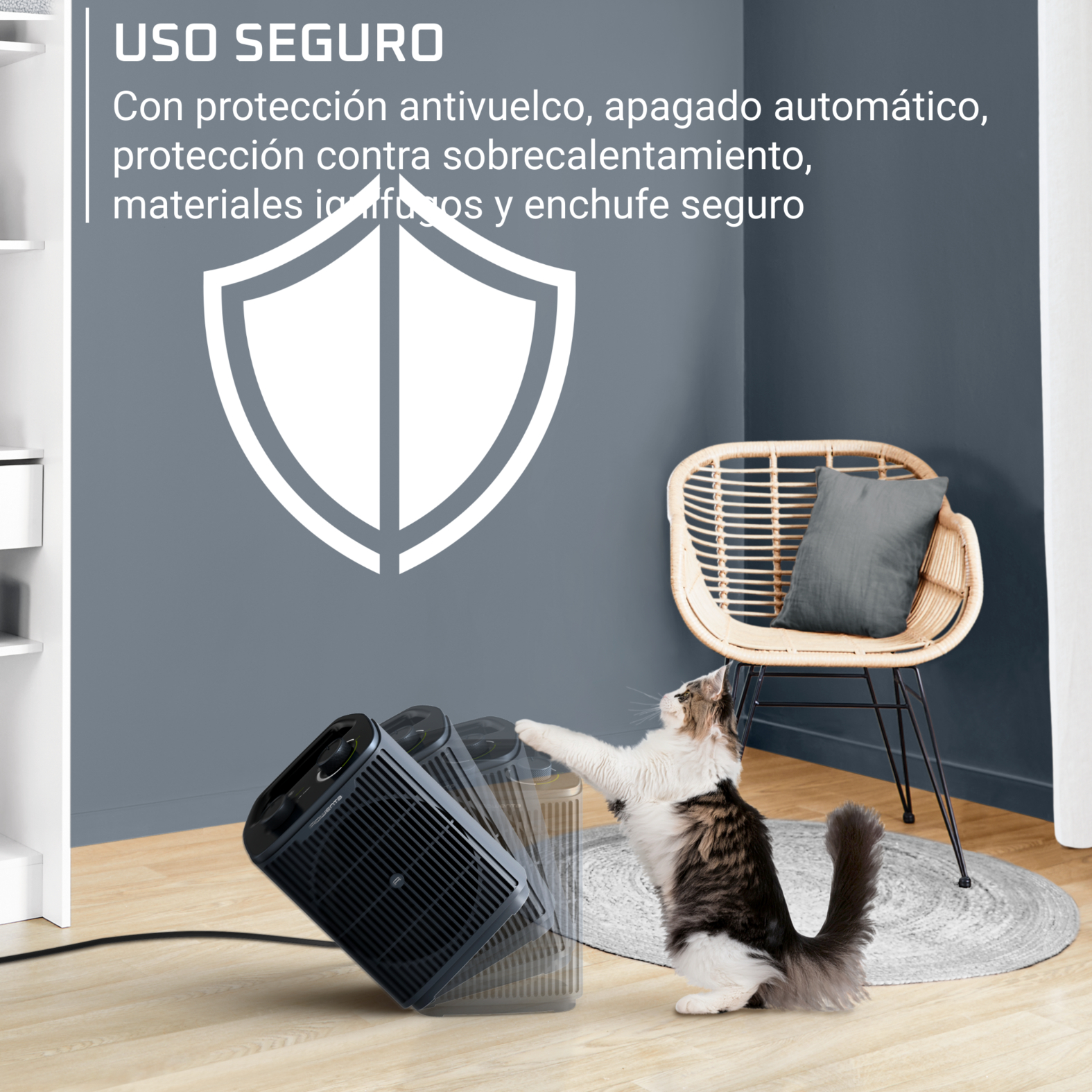 Un gato tira un calefactor negro, que se muestra cayendo en fases. Al fondo, un sillón de mimbre y texto en la pared.