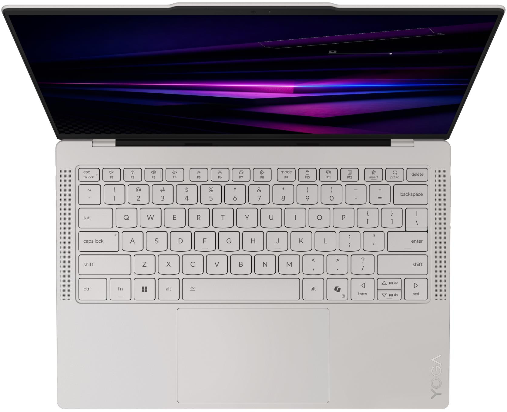 Ezüstszínű laptop felülnézete, billentyűzetével és megvilágított képernyőjével.