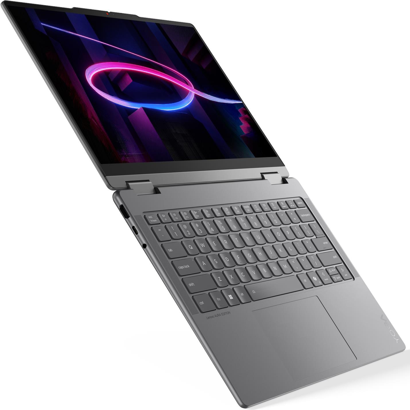 Egy szürke laptop világító képernyőjén egy absztrakt rózsaszín fénycsík látható sötét háttér előtt.