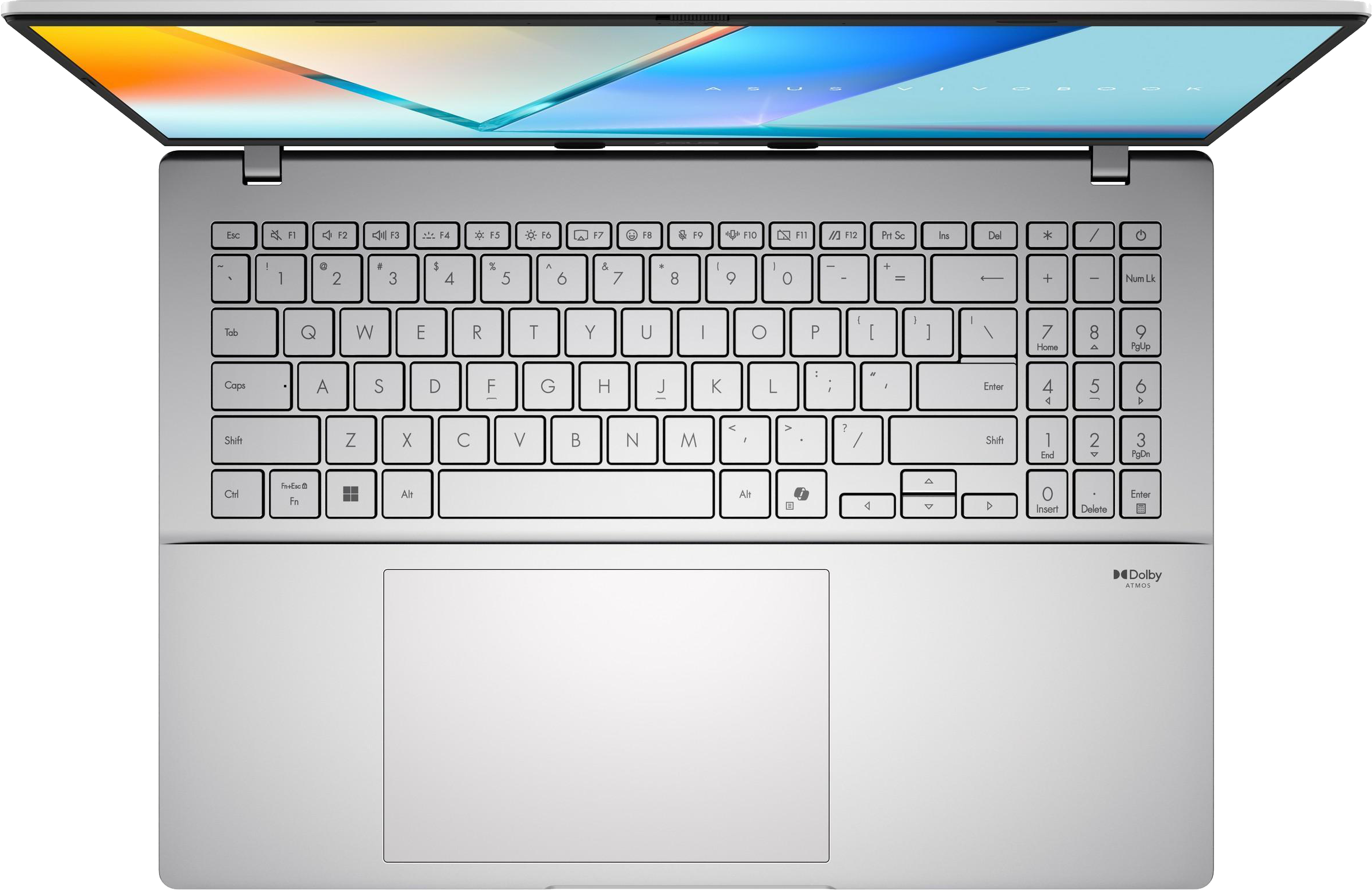 Ezüstszínű laptop billentyűzet felülnézetből, numerikus paddal és érintőpaddal, a képernyőn kék-sárga dizájn látható.