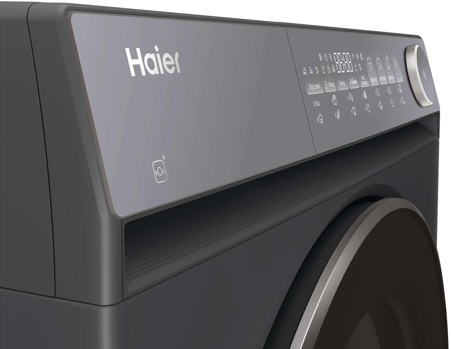 Szürke Haier mosógép digitális kijelzőpanellel, érintőgombokkal és forgatógombbal.