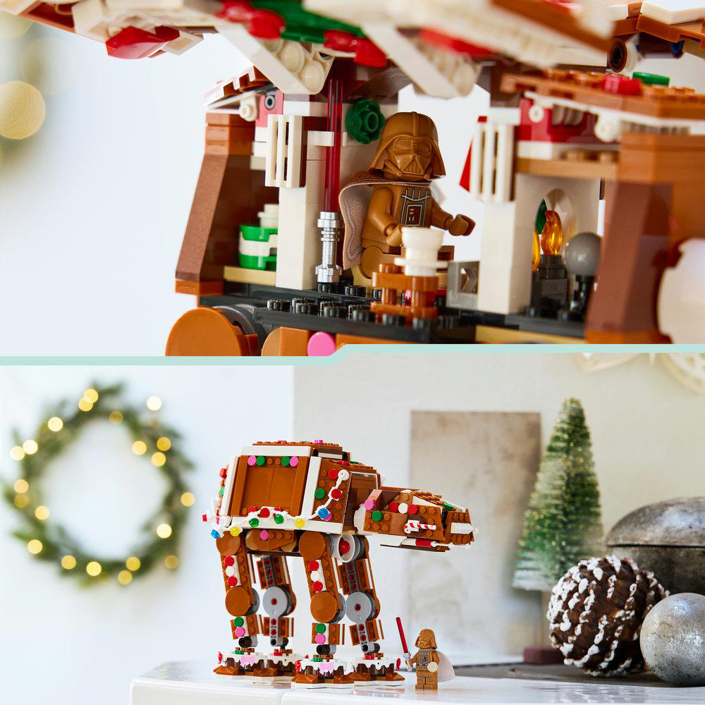 Ein Lego-AT-AT verziert mit Weihnachtslichtern und eine Darth Vader Minifigur vor einem Kranz.