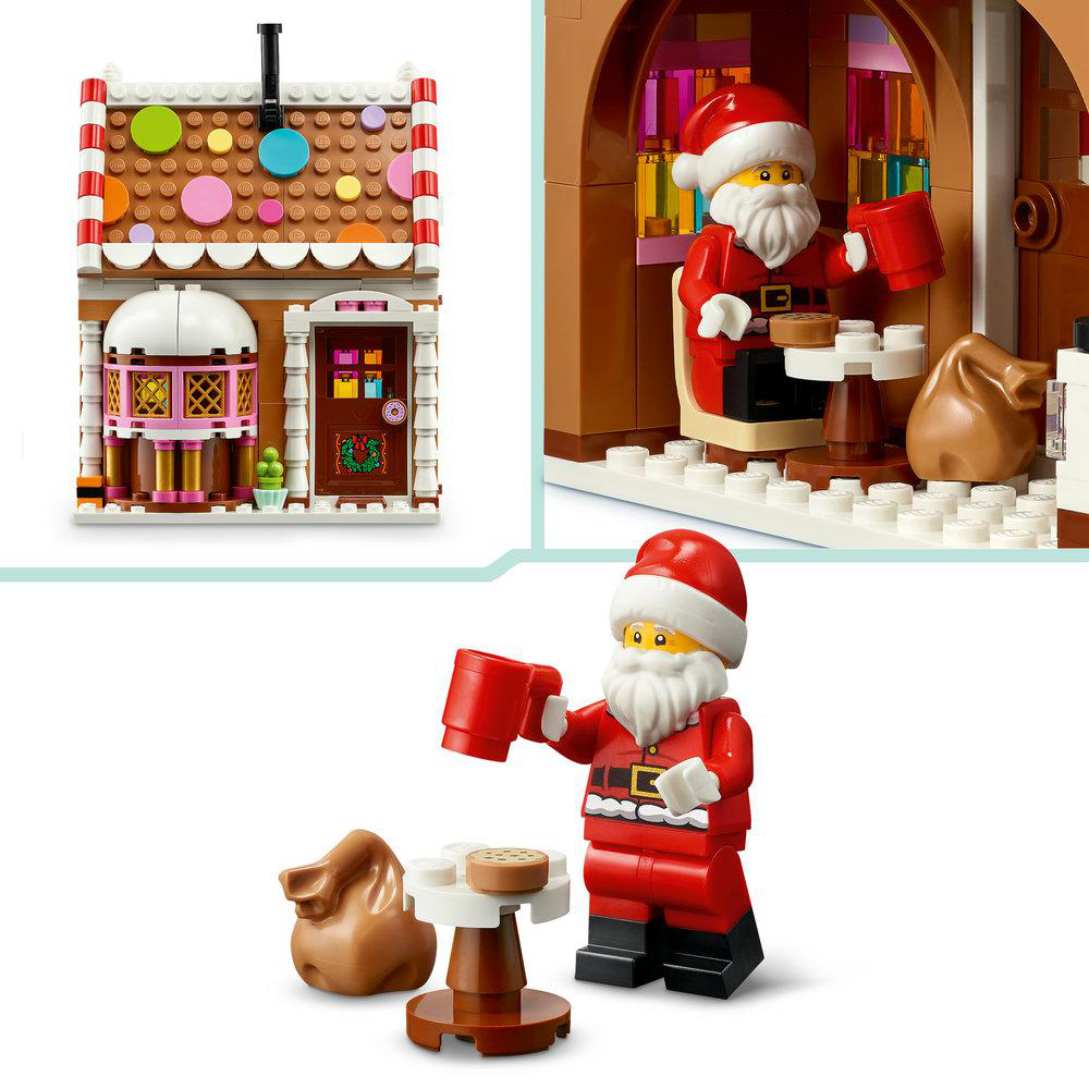 Lego-Weihnachtsmann-Minifigur mit Tasse und Geschenkesack vor einem bunten Lebkuchenhaus.