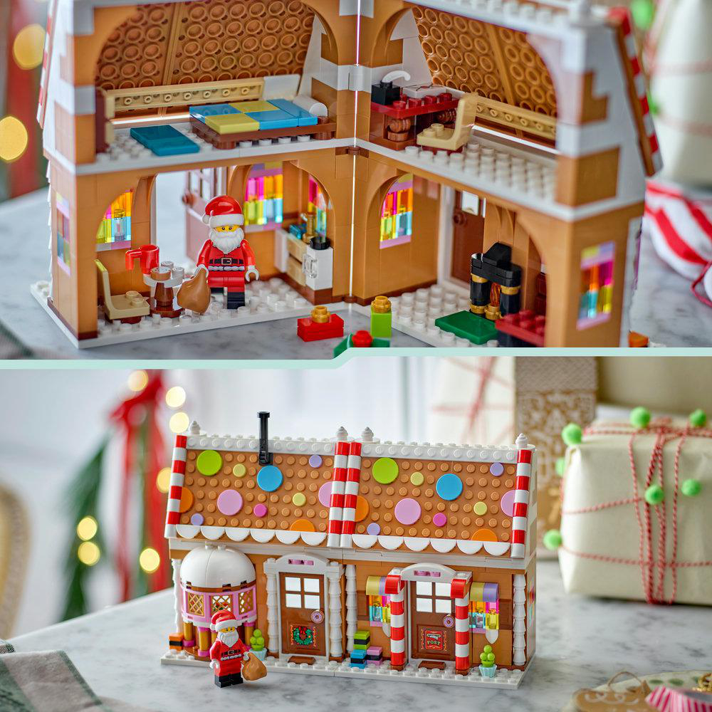 Ein Lego-Lebkuchenhaus mit geöffneter Rückseite zeigt Innenräume, eine Weihnachtsmann-Minifigur und geschmückte Fassaden.