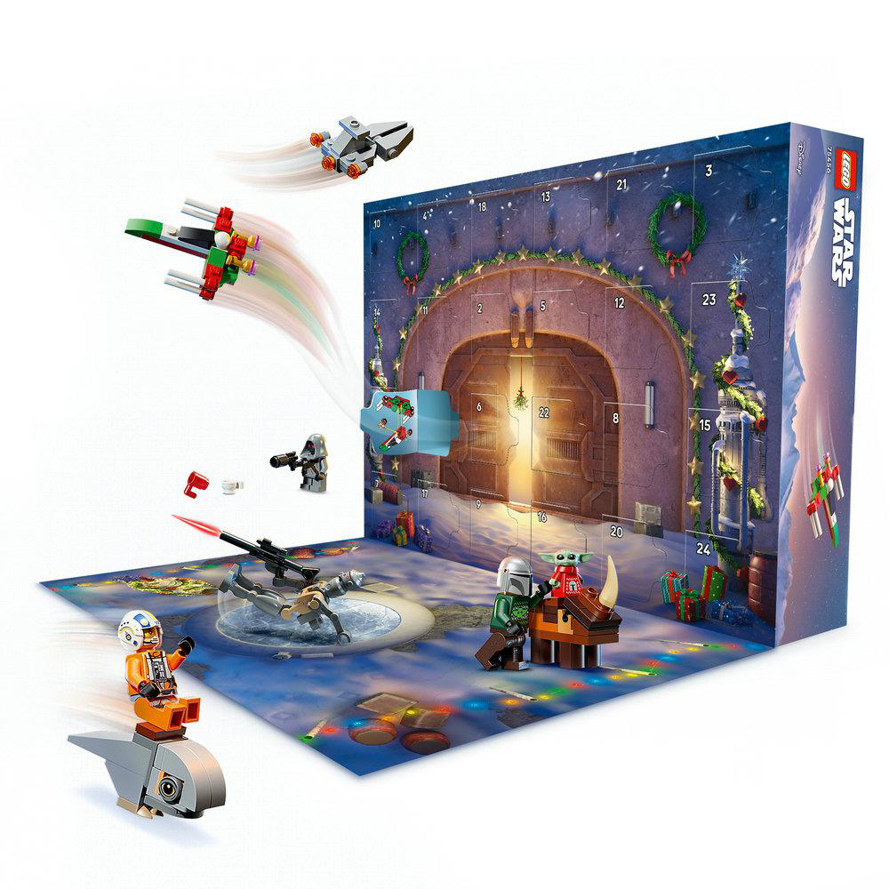 Lego Star Wars Adventskalender mit Figuren und Raumschiffen vor einer weihnachtlichen Hintergrundszene.