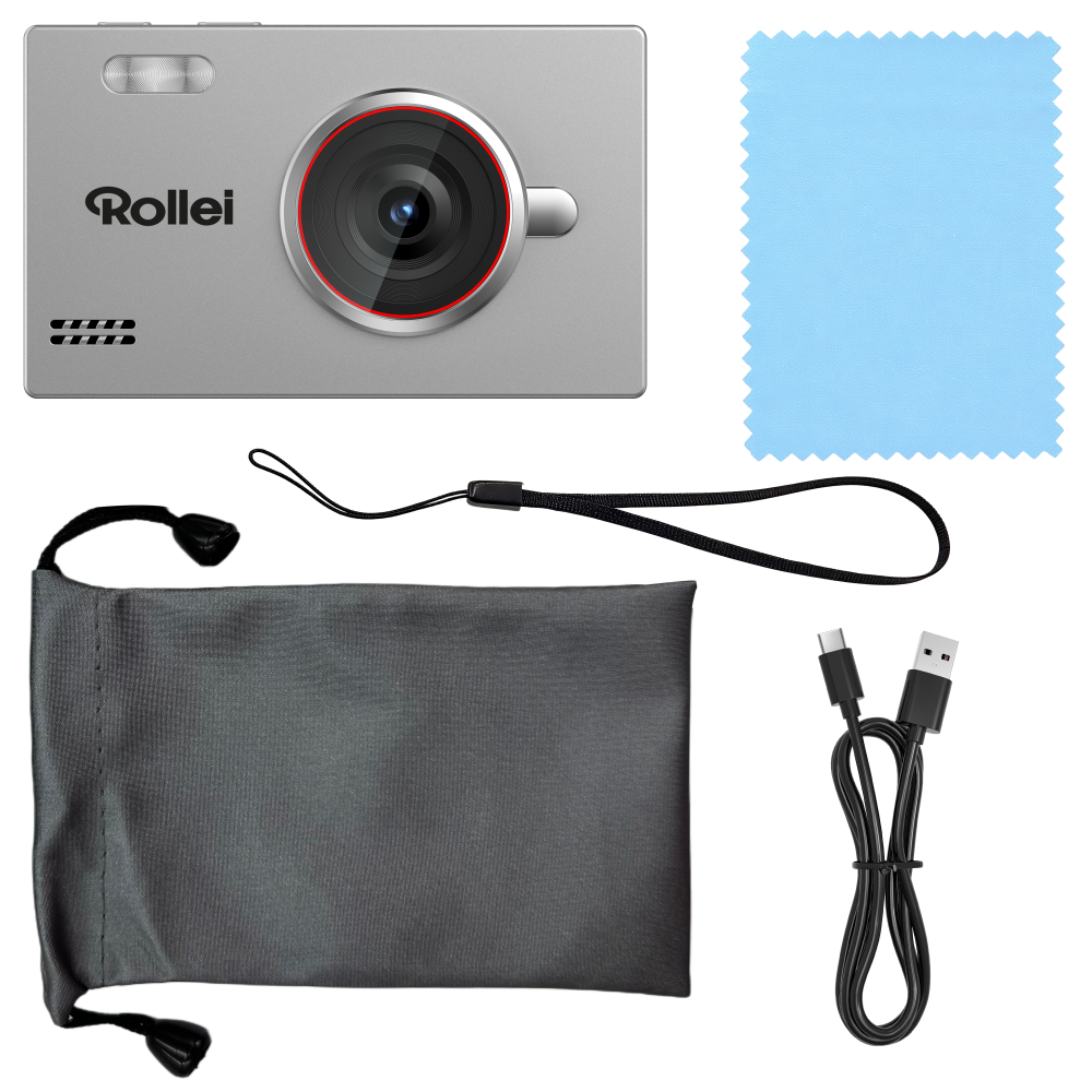 Silberne Rollei-Kamera mit Reinigungstuch, Tasche, Handschlaufe und USB-Kabel auf schwarzem Grund.